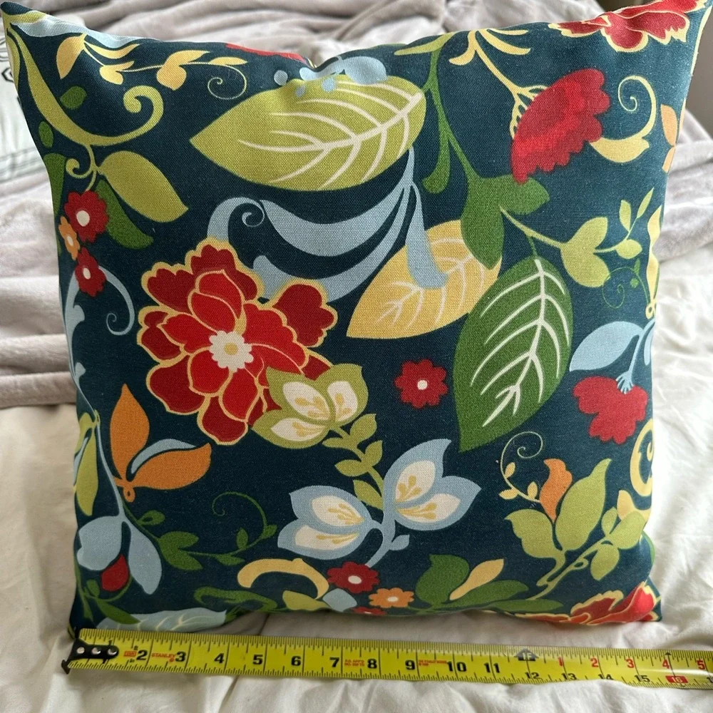 Floral pillow with design on both sides